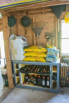 there are many different tools on the shelf in this shed, and it's hard to find