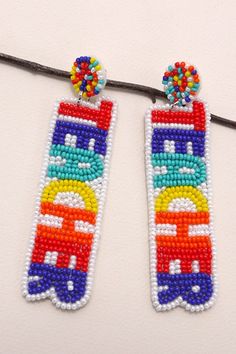 Seedbead Teacher Drop Earrings, these earrings feature meticulously crafted seed beads arranged in a charming design that pays tribute to the teaching profession. With their vibrant colors and playful design, these earrings are a stylish way to show appreciation for teachers. Whether you're attending a school event, parent-teacher conference, or simply want to add a touch of whimsy to your outfit, these earrings are sure to make a statement and spark conversations. Product details:length: 3.5"wi Teacher Perler Beads, Teaching Profession, Post Metal, Parent Teacher Conferences, School Event, Show Appreciation, Parents As Teachers, Earring Backs, Playful Design