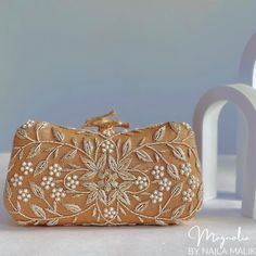 Striking and unique mysore clutch offers detailed embroidery of Dabka, Zardozi and pearl work featuring a statement branch clasp. This clutch bag comes with a detachable chain.  Measurements: 19 x 11 x 4 cm Can be made on any colour. Please message your colour requirements before placing the order.  Pre orders take 6 weeks for the making Pearl Work, Detailed Embroidery, Evening Purse, Mysore, Unique Bags, Party Bag, Perfect Bag, Bridal Gifts, Clutch Handbag