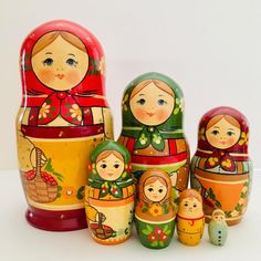 a group of nesting dolls sitting next to each other