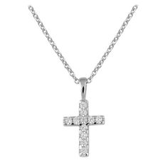 Children's fine jewelry - This beautiful sterling silver necklace features a cross pendant accented with 11 white cubic zirconia. The cross is on a 15 inches trace chain with lobster claw clasp. A delicate gift for girls from toddler to preteen for any special occasion such as christening, baptism or communion, etc. Sterling Silver Crucifix Necklace With Diamond Accents, Silver Sterling Silver Cross Diamond Necklace, White Cubic Zirconia Cross Necklace, Diamond White Crucifix Necklace As Gift, Sterling Silver Cross Pendant For First Communion, Sterling Silver White Gold Necklace For First Communion, Diamond White Sterling Silver Crucifix Necklace, Silver Cross Pendant Jewelry For First Communion, White Gold Cross Jewelry For First Communion