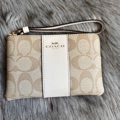 Coach Wristlet In Gold/Khaki Good As New Tags In Wristlet Card Holders Inside Wrist Strap Coach Gold Rectangular Wristlet, Beige Rectangular Wristlet For Travel, Elegant Beige Coach Wristlet, Gold Rectangular Coach Wristlet, Elegant Beige Clutch Wristlet, Elegant Beige Clutch With Wrist Strap, Elegant Beige Rectangular Wristlet, Coach Beige Pouch Wristlet, Beige Coach Pouch Wristlet