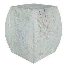 a white wooden block sitting on top of a table