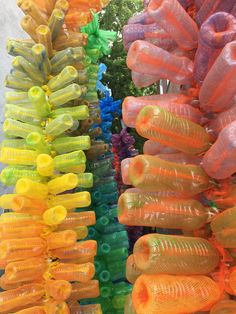 there are many different colored plastic objects on display