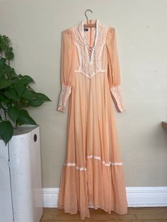 "In amazing condition with no flaws other than holes under both arm pits as pictured. Price has been adjusted to reflect this flaw. Length - 55\" Breast - 30\"  Waist - 23/24\" Hips - free" 1970s Fitted Maxi Dress, 1970s Fitted Maxi Dress For Daywear, Fitted 1970s Vintage Dress For Daywear, 1970s Fitted Vintage Dress For Daywear, 1970s Style Fitted Vintage Dress For Daywear, Fitted Vintage Maxi Dress, 1970s Style Fitted Maxi Vintage Dress, 1970s Fitted Maxi Length Vintage Dress, Vintage Style Fitted Dress For Festivals