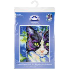 a package of cross stitch kits with a cat's face