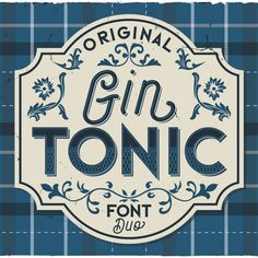 an old fashioned gin tonic sign on a blue and white checkered background with the words gin tonic