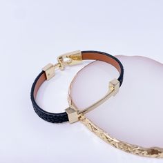 Brand New Leather Bracelet With Metal Clasp Classic Black Bracelets As Fashion Accessory, Minimalist Metal Leather Bracelet For Everyday Wear, Elegant Black Leather Bangle Bracelet, Chic Adjustable Black Leather Bracelet, Elegant Everyday Jewelry With Black Band, Elegant Gold Bracelet With Black Band, Womens Jewelry Bracelets, Gold Black, Leather Bracelet