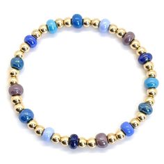 Beautiful Blue Bracelet Stacks Create a uniquely eye-catching blue-tone wrist stack with these glass seed bead stretch bracelets. Handcrafted in NYC in gold fill or sterling silver. 14K gold-filled or sterling silver 2mm, 3mm, & 4mm beads; colorful glass seed beads; 6mm glass bubble beads; stretch style. Water safe, tarnish-resistant. Great solo or stacked. Handmade in NYC. View gold ball bracelets. View silver bead bracelet. View rose gold bead bracelet. Blue Stackable Stretch Bracelet For Everyday, Blue Stackable Stretch Bracelet, Stackable Blue Stretch Bracelet, Blue Stretch Bracelet With Tiny Beads, Adjustable Blue Stackable Stretch Bracelet, Blue Adjustable Stackable Stretch Bracelet, Blue Beaded Bracelets With Tiny Beads For Everyday, Everyday Blue Bracelets With Spacer Beads, Everyday Blue Beaded Bracelets With Tiny Beads