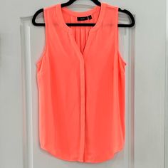 Apt. 9 Sleeveless Coral Blouse. Size Medium. Loose Fitting. Bright Coral Color As Shown In Picture. Like New - Never Worn. Pink Tank Top For Summer Workwear, Summer Sleeveless Camisole For Workwear, Casual Sleeveless Camisole For Work, Coral Blouse, White Shirts, Coral Color, Color Orange, Shirts Tops, Loose Fitting