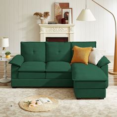 a living room with a large green couch