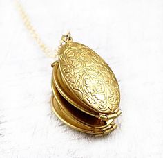 Folding Locket Necklace Four Photo Locket Necklace Gold | Etsy Elegant Oval Locket Necklace For Anniversary, Elegant Oval Locket Necklace For Anniversary Gift, Antique Gold Oval Locket Necklace For Gift, Oval Locket Necklaces For Anniversary, Oval Locket Jewelry For Anniversary Gift, Oval Locket Necklace For Anniversary Gift, Victorian Oval Locket Necklace As Gift, Victorian Oval Locket Necklace Gift, Antique Gold Oval Locket Necklace For Keepsake