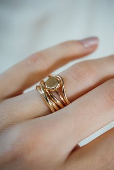 A curved arc stacking ring made from 14K Gold Fill Metal. After countless requests and some fine tuning, we finally perfected this ring shape! The Teardrop Ring stacks with all of our rings beautifully. It adds dimension to any stacking rings you wear daily but it also makes the perfect, low-key wedding band! The bend in the Teardrop Ring curves to hug a set stone beautifully if you are looking for a complimentary piece for your existing engagement ring. This listing is for ONE SINGLE RING.Made Stackable 14k Gold Bypass Ring With Open Band, 14k Gold Stackable Bypass Ring With Open Band, Fine Jewelry 14k Gold Stackable Open Band Rings, Adjustable 14k Gold Stackable Rings, 14k Yellow Gold Filled Stackable Open Rings, 14k Gold Stackable Open Band Rings, 14k Gold Open Band Stackable Rings, Gold Handcrafted Stackable Rings, 14k Gold Hand Forged Open Ring