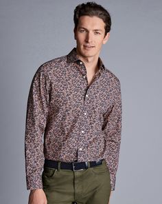 100% cotton, Available in classic and slim fit, Made with Liberty fabric, made in Italy, Semi-spread collar, Rounded button cuff with one button, Classic and slim fit: back pleats, Machine washable - Made With Liberty Fabric Floral Print Semi-Cutaway Collar Shirt - Pink | Men's Charles Tyrwhitt Made With Liberty Fabric Floral Print Semi-Cutaway Collar Shirt - Pink Size Large Cotton Cotton Dress Shirt With Casual Collar For Office, Slim Fit Dress Shirt With Casual Collar, Fitted Cotton Dress Shirt With Casual Collar, Semi-formal Slim Fit Dress Shirt With Casual Collar, Custom Fit Cotton Long Sleeve Shirt, Custom Fit Long Sleeve Cotton Shirt, Custom Fit Long Sleeve Shirt For Workwear, Cotton Shirt With Lapel Collar For Business Casual, Semi-formal Cotton Shirt With Spread Collar