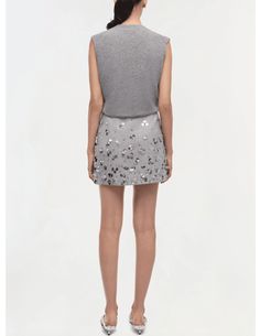 Simkhai Larissa Embellished Mini Skirt in heather grey. All Sale Merchandise is FINAL SALE. Mini length. Whimsical, silver floral embellishment. Conceal side zipper closure. Model is 5'11" and wearing size 2 Concealed side zipper closure. Shell: 100% Wool, Lining: 100% Polyester. Dry clean only. Imported. Minnie Rose, Floral Embellishment, Denim Flares, Cynthia Rowley, Cotton Poplin, Heather Gray, Denim Dress, Side Zipper, Jacket Dress