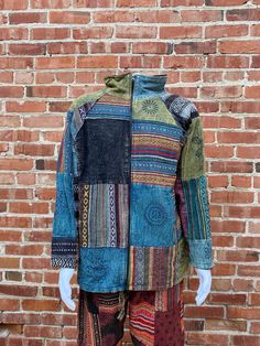 Handmade Nepali Jacket with Colorful Patchwork Fleece Lined and very warm Protective against cold winter temperatures. Size L and XL available  Please message with any questions! Hooded Multicolor Outerwear With Fleece Lining, Multicolor Hooded Outerwear With Fleece Lining, Casual Multicolor Long-sleeved Hooded Jacket, Casual Multicolor Hooded Jacket, Casual Multicolor Hooded Jacket With Long Sleeves, Multicolor Long Sleeve Hooded Jacket With Pockets, Casual Multicolor Long Sleeve Hooded Jacket, Multicolor Long Sleeve Hooded Casual Jacket, Cozy Patchwork Tops For Winter