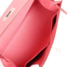 This Kelly, in the Sellier style, is in Rose Confetti epsom leather with palladium hardware and has tonal stitching, front flap, two straps with center toggle closure, clochette with lock and two keys a single rolled handle and removable shoulder strap.The interior is lined with Rose Confetti chevre leather and has one zip pocket with an Hermes engraved pull and two open pockets on the opposite side.Collection: YOrigin: FranceCondition: New and never worn (plastic on hardware)Accompanied by: Hermes Box, Dustbag, lock, 2 keys, clochette, clochette dustbag, strap, strap dustbag, felt, carebook, rainhatMeasurements: 11.25" width x 8.25" height x 4.75" depth; 3.5" handle drop (16.5" shoulder strap drop) Classic Pink Epsom Leather Bag, Formal Pink Epsom Leather Bag, Rose Confetti, Hermes Kelly Sellier, Kelly Sellier, Prada Jewelry, Hermes Birkin 25, Hermes Birkin 30, Hermes Box