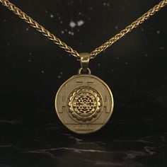 This is a Sri Yantra necklace, a handmade jewelry. This unisex necklace is the perfect gift for him and her any time of the year  Unlock the power of divine geometry and embrace spiritual enlightenment with our handmade Sri Yantra necklace. Immerse yourself in the sacred symbol's profound energy as you embark on a journey of self-discovery and cosmic connection. Handmade with meticulous care and attention to detail, each necklace is a unique expression of spiritual artistry. The Sri Yantra, know Divine Geometry, Cosmic Connection, Divine Masculine, Sri Yantra, Chakra Necklace, Bronze Necklace, Sacred Symbols, Unisex Necklace, Spiritual Enlightenment