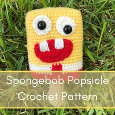 a crocheted spongebob popsicle is sitting in the grass