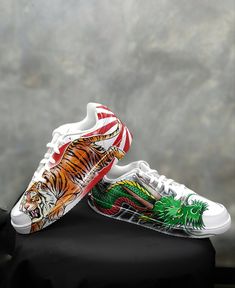 "Custom Nike Kicks The \"TIGER-DRAGON\" JAPANESE Sneakers -OUR WORK All of my artworks are handpainted and unique! This is the reason why i prefer to paint everytime different designs. The shoes are ordered in to be painted according to your custom requirements. The photos in this listing are an example so as to understand the quality and the details that my artworks have. They are totally hand painted using special Angelus acrylic colours and special LK finisher, one of the best in the market P Artistic Hand Painted High-top Sneakers, Hand Painted Custom Low-top Sneakers With White Sole, Artistic Hand Painted High-top Custom Sneakers, Artistic Hand Painted Custom Sneakers, Custom Hand Painted Sneakers With White Sole, Custom Hand-painted Sneakers With White Soles, Custom Hand-painted Sneakers With White Sole, Hand Painted Lace-up Sneakers With White Sole, Hand Painted Lace-up Leather Custom Sneakers