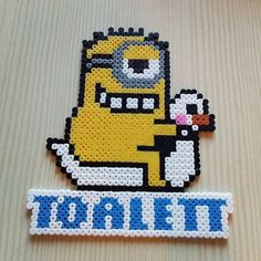 a piece of art made out of perler beads with the word titans on it