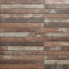 a brown and white brick wall that is made out of wood