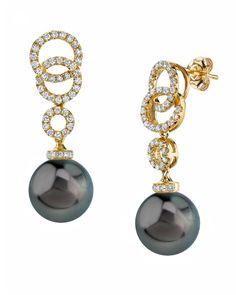 A beautiful pair of Tahitian South Sea cultured pearl earrings with gorgeous 18K gold mountings. Our Tahitian pearls come directly from the pearl farms of Tahiti. These pearl earrings are AAA quality with Very High luster (please see our pearl grading section for more information). These pearl earrings comprise of approximately .78 carats of SI-quality diamonds on both mountings and are made of 3.5 grams of the highest quality 18K gold. All pearl earrings are approved by our staff of GIA pearl e Tahitian Pearl Earrings, Pearl Farm, Link Earrings, Sea Pearl, South Seas, South Sea Pearls, Sea Pearls, Tahitian Pearls, Pearl Diamond