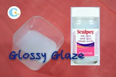 a bottle of glossy glaze next to an empty container on a pink background