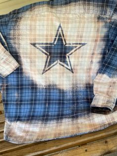 This is a  bleached flannel featuring a cowboy/western star. These shirts are men's sizes and can be custom ordered to your liking. They are new and not up cycled. Back features the star while the front has bleached collar tips, sleeves, pocket flaps and hems. Looks awesome with your team shirt layered underneath. -wear this custom shirt to a football game, festival or tailgate party! Perfect Christmas gift for the Dallas fan! Shipping time usually is shorter than indicated. No two are exactly the same; Therefore, yours may not look exactly like the ones pictured. Shirt patterns could be different based on what is in stock. Shirt Patterns, Bleached Flannel, Custom Flannel, Collar Tips, Western Star, Texas Star, Cowboy Shirt, Cowboys Shirt, Team Shirt