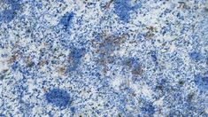 blue and white granite textured with brown spots