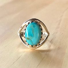 Natural, oval, Turquoise ring in solid 925 sterling silver, ring size 7.75. Classic Turquoise Ring With Oval Cabochon, Classic Oval Cabochon Turquoise Ring, Turquoise Oval Cabochon Ring For Anniversary, Turquoise Oval Cabochon Ring With Large Stone, Classic Oval Turquoise Gemstone Ring, Turquoise Oval Cabochon Ring, Oval Cabochon Turquoise Ring For Anniversary, Oval Turquoise Ring For Anniversary, Untreated Oval Turquoise Ring For Anniversary