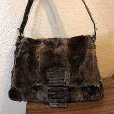 Fendi & Lizard Green Mink Fur Baguette Condition: Gently Used Soft Dark Green And Brown Mink Fur Exterior Trimmed With Green Lizard Leather Handle And Front Ff. Silver Hardware Through Out Beige Leather Interior With One Sided Zippered Pocket No Stains Or Smells I’m Really Clean With My Bags Very Rare Baguette Louis Vuitton Planner, Fendi Fur, Fendi Tote Bag, Fendi Baguette Bag, Green Lizard, Mini Hand Bag, Fendi Tote, Fendi Vintage, Fendi Handbag