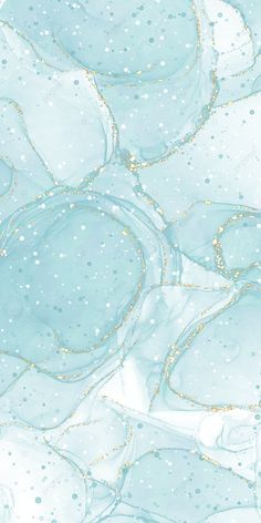 an abstract blue and white background with gold glitters on it's edges, as well as bubbles in the water