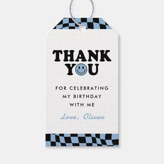 a blue and black checkered tag with the words thank you for celebrating my birthday