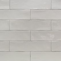 a white brick wall with no mortars on it