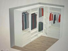 an open closet with clothes hanging in it