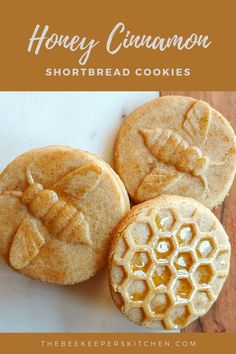 three honey cinnamon shortbread cookies sitting on top of a white plate with the words, honey cinnamon shortbread cookies