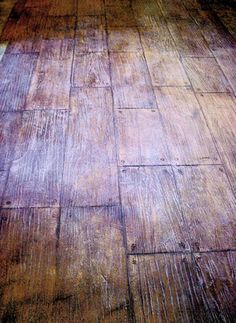 an old wooden floor with peeling paint on it and the words point written in red