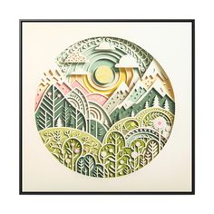 a circular artwork with trees and mountains in the background, on a white paper sheet