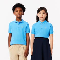 Lacoste, inventors of the polo shirt in 1933, presents this version that’s just for kids. Made from our iconic, supple, elegant piqué fabric for full freedom of movement. A timeless blend of fashion and sportswear, featuring ribbed details and a signature crocodile logo. Classic Polo Shirt With Polo Collar For School, Classic Polo Shirt For School, Classic Solid Polo Shirt For School, Classic School Polo Shirt, Tennis Whites, Lacoste Shoes, Crocodile Logo, Inventors, White Polo