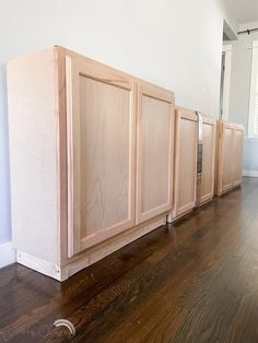 the unfinished cabinets are lined up against the wall