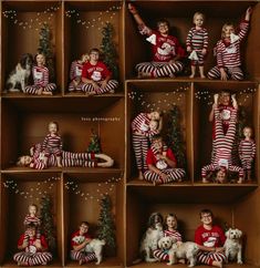 a group of children in christmas pajamas sitting on boxes with their dogs and trees around them