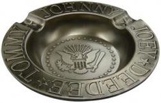 a metal bowl with the seal of the united states on it and an inscription that reads,