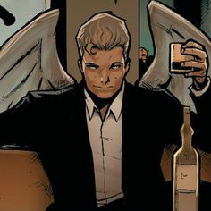 a man in a black suit and white shirt with angel wings on his head holding a bottle of wine