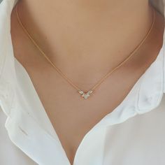 "Minimal chevron shaped charm embellished with marquise and round cut crystals. This necklace is very flattering around the necklace line. Charm: 11mm Necklace Chain Length: 15\" inches + 2\" extension  MATERIALS: Cubic Zirconia Gold, Rose Gold, or Rhodium Plated Brass Need some jewelry inspiration? Follow us on Instagram  @statementgrey" Mia Necklace, Gold Necklace Delicate, Simplistic Jewelry, Hand Jewelry Rings, V Necklace, Wedding Jewelry Sets Bridal Jewellery, Interlocking Circle Necklace, Delicate Gold Necklace, Modern Gold Jewelry