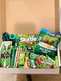 an open box filled with snacks and other items