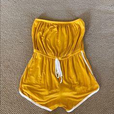 Never Worn. Comfort Meets Sports Fashion With This Strapless Tracksuit Styled Romper! Style Up With A Jacket Or Even Wear As A Swim Cover. Fits More Like An Xs Than A S. Sporty Stretch Tube Top For Sports, Stretch Jumpsuits And Rompers For Sports, Spring, Spring Sports Stretch Jumpsuits And Rompers, Stretch Jumpsuits And Rompers For Spring Sports, Spring Sports Jumpsuits And Rompers With Stretch, Spring Stretch Strapless Jumpsuit For Loungewear, Spring Strapless Stretch Jumpsuit For Loungewear, Strapless Tube Top For Summer Workout, Strapless Summer Workout Tops