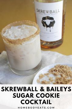 a drink and some food on a table with the words skrewball & bailey's sugar cookie cocktail