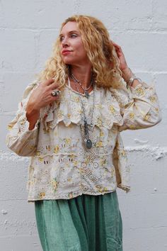 Magnolia Pearl Eadred Eyelet Blouse in Lauretta ♡ Product Highlights ♡ Our Magnolia Pearl Eadred Eyelet Blouse in Lauretta blends the influences of the far-flung, woven together in a supple and stable homage to the homespun. Spinning in this great web of being, under the sun. As a layered flourish or a standalone statement, our Eadred Eyelet Blouse exudes tenderness and true beauty - a new nostalgia that beckons the senses to dream in all directions. For the urban mystic, the jaunty jester momma Spring Bohemian Daywear Blouse, Bohemian Spring Top With Lace Trim, Spring Daywear Tops With Boho Collar, Spring Boho Collar Tops For Daywear, Spring Peasant Top With Boho Collar, Spring Festival Blouse With Boho Collar, Spring Festival Boho Collar Blouse, Pearl Jacket, Eyelet Blouse