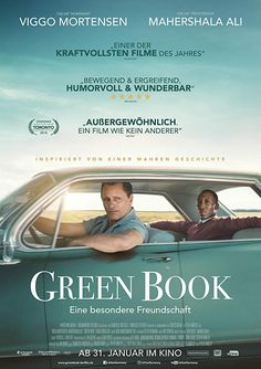 the green book movie poster with two men in a car